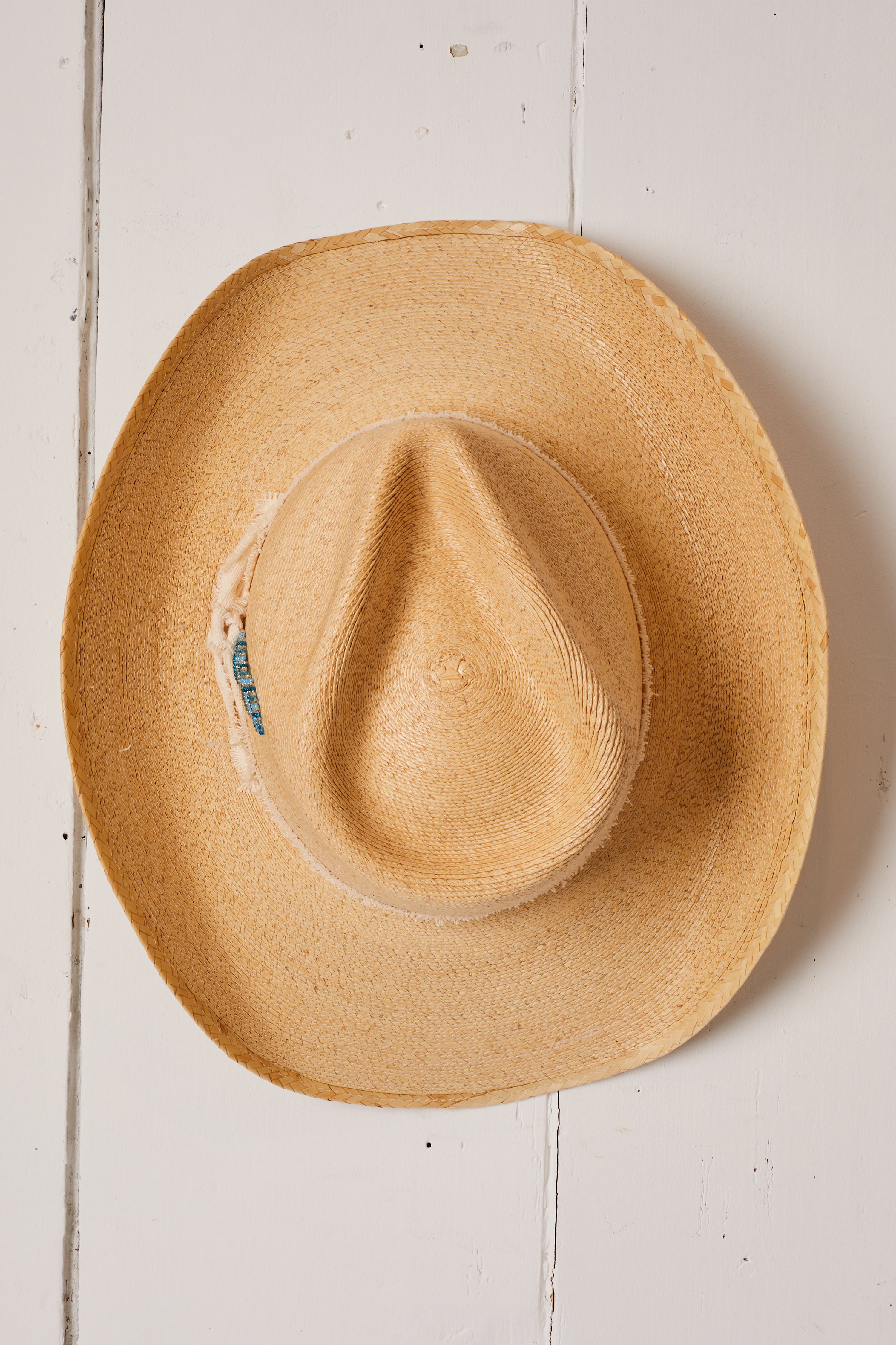 STRAW COWBOY HAT WITH BEADED FEATHER