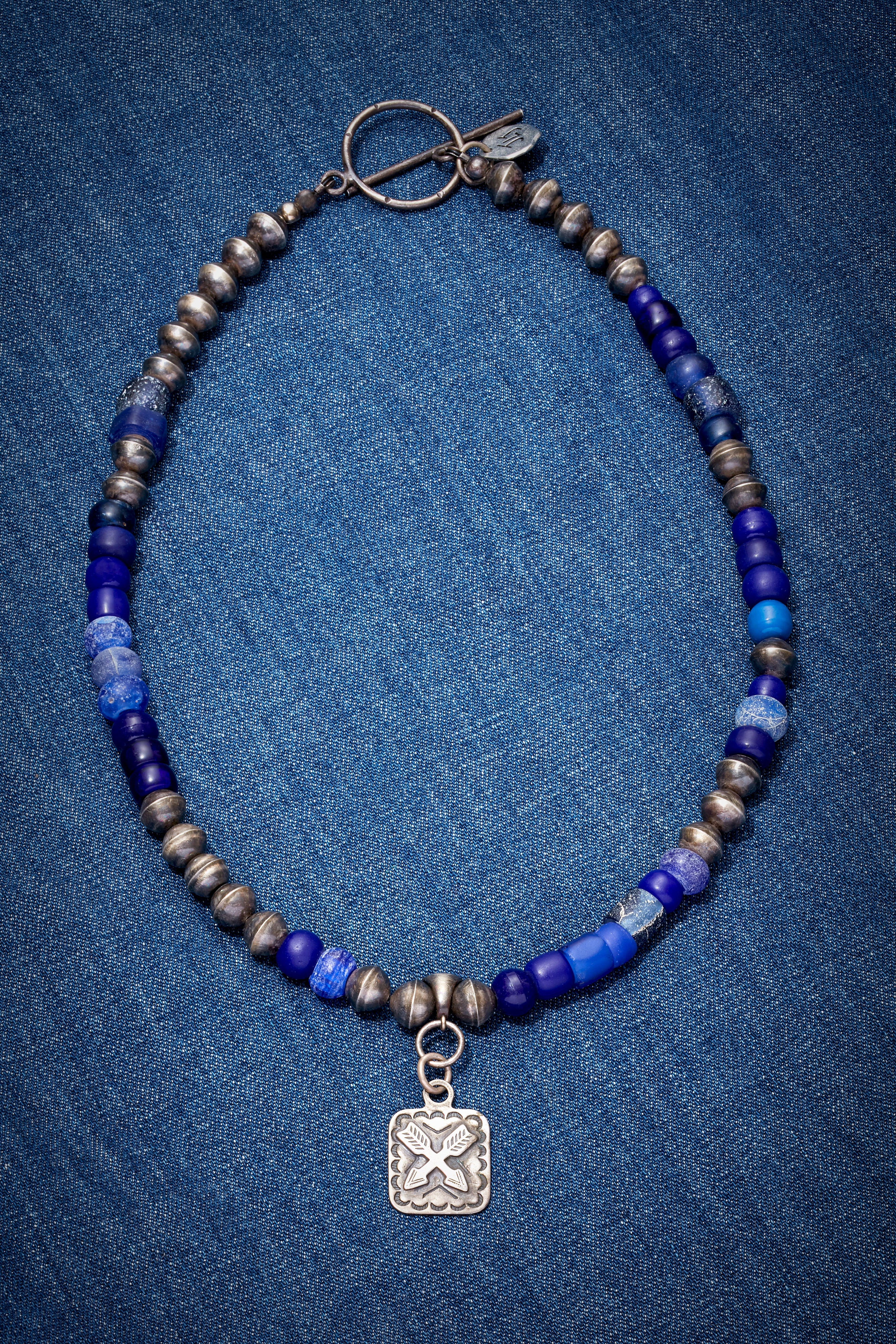 OXIDIZED STERLING SILVER AND BLUE NECKLACE WITH VINTAGE CROSSED ARROWS FRIENDSHIP PENDANT