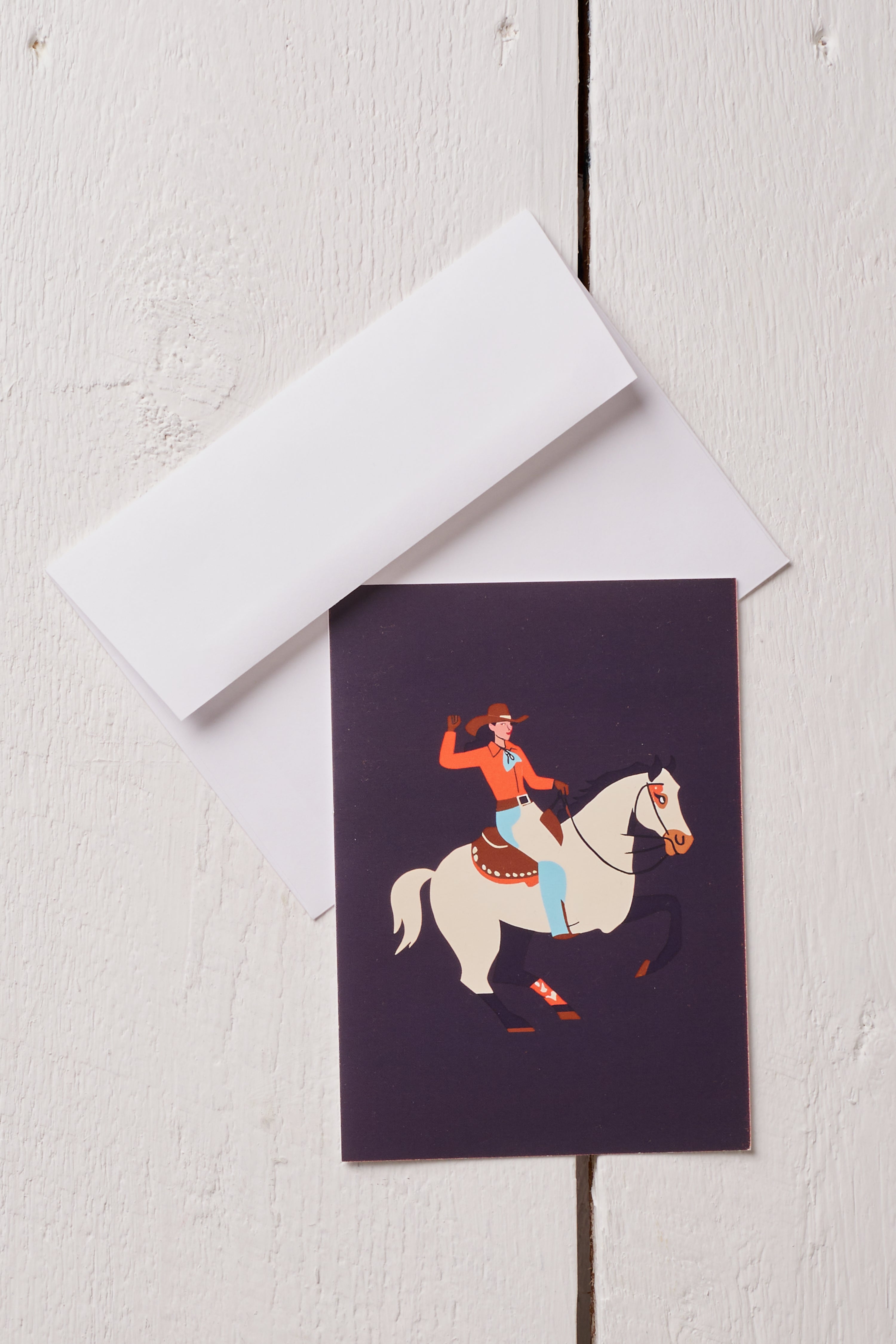 COWGIRL ON HORSE GREETING CARD