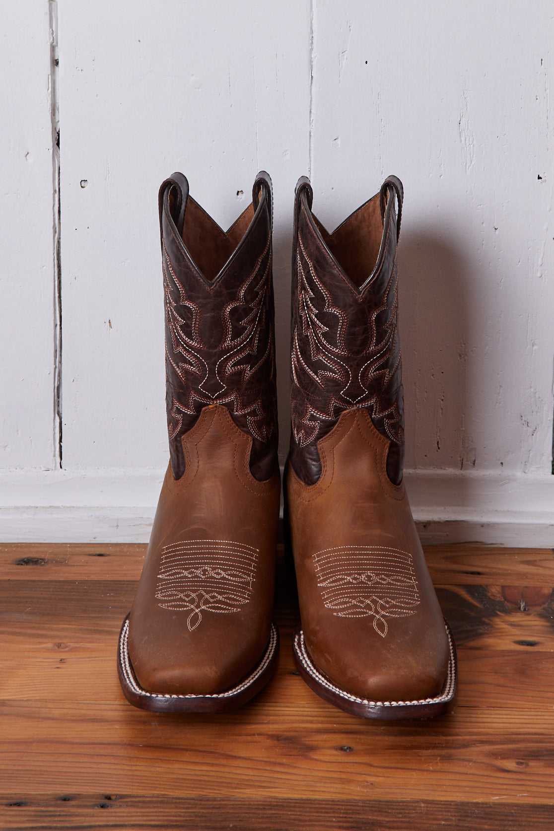 TAN AND BROWN COWBOY BOOTS