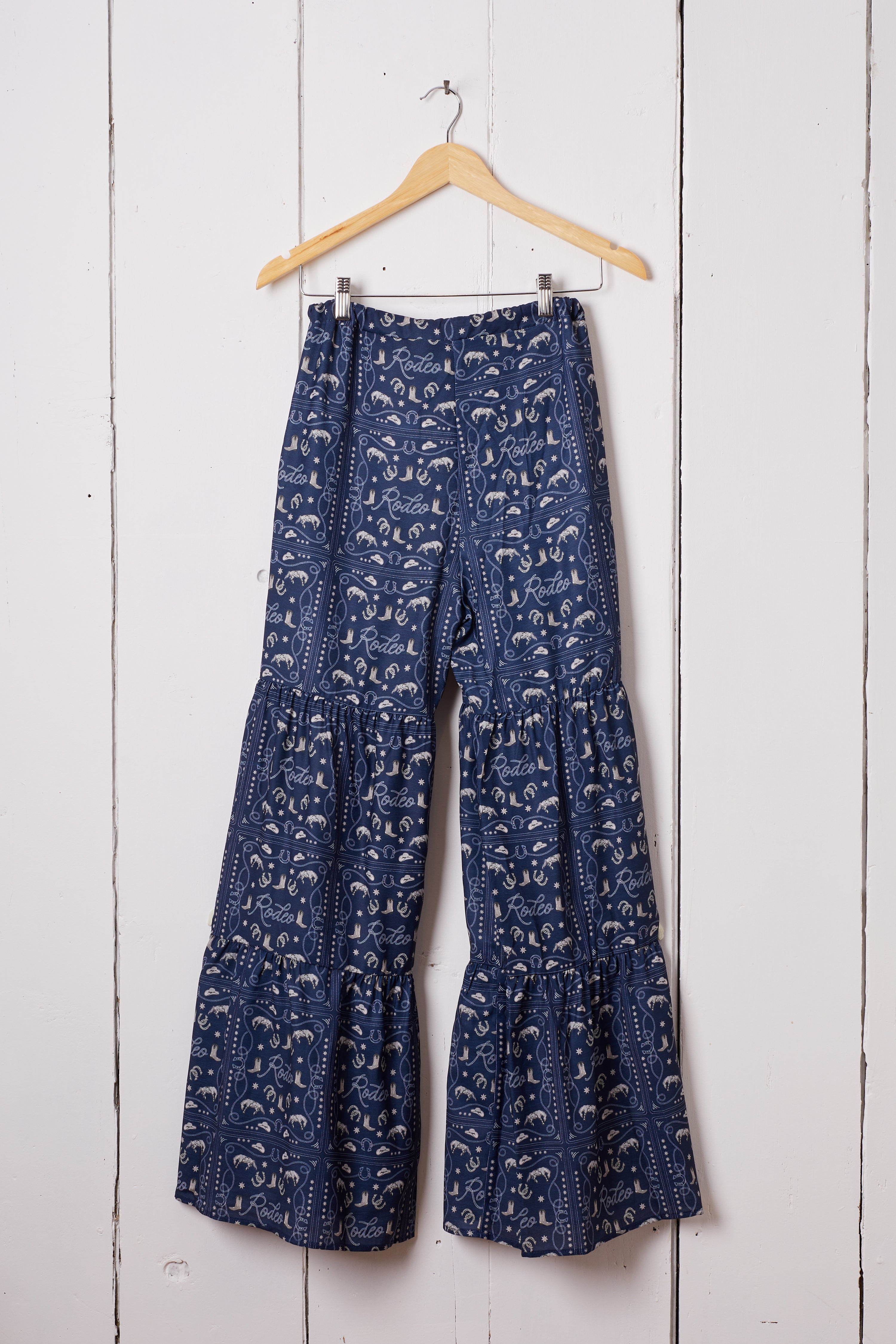 NAVY RODEO RUFFLE PANTS