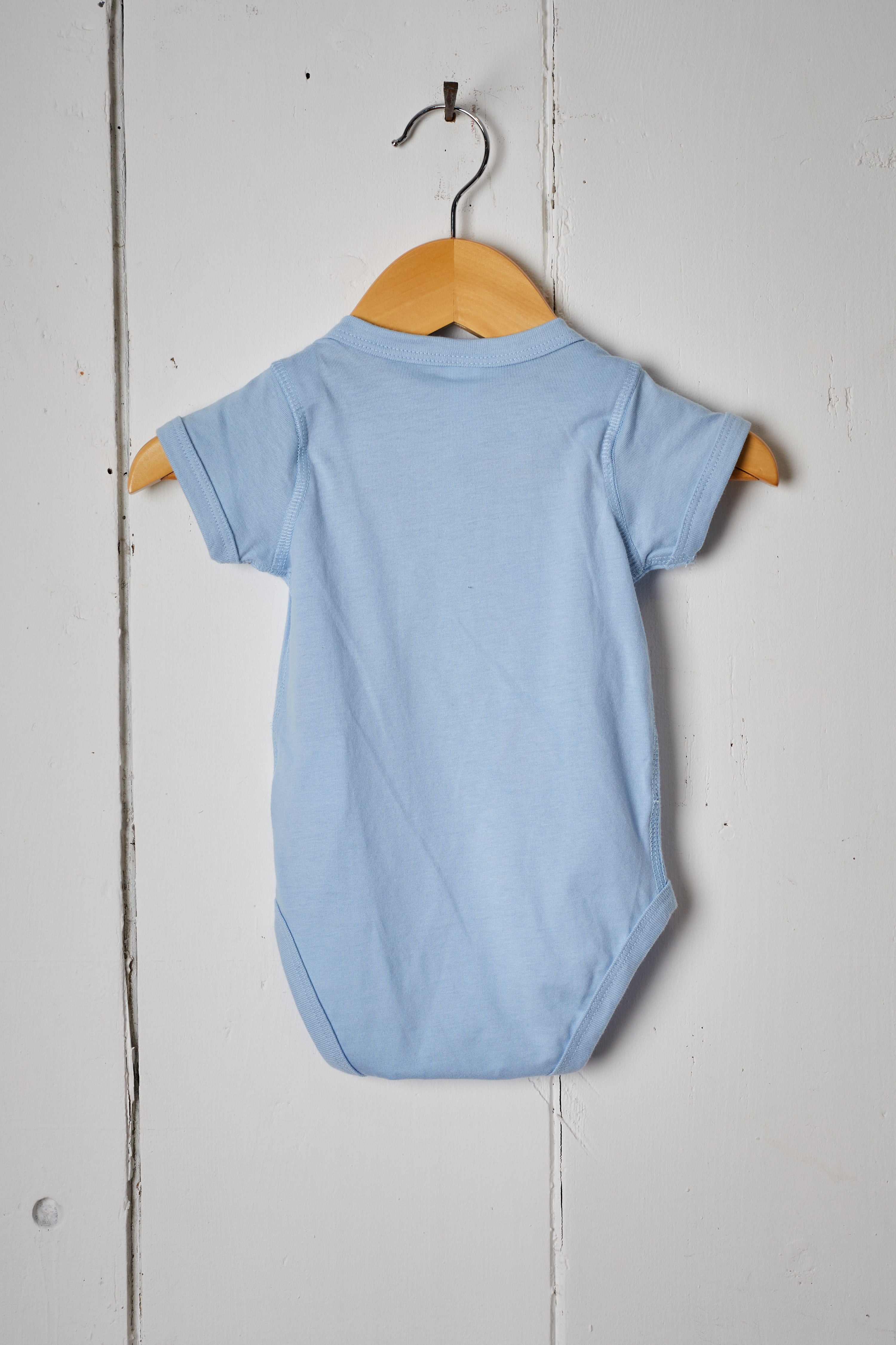 JENNY’S BARN BABY BLUE ONESIE