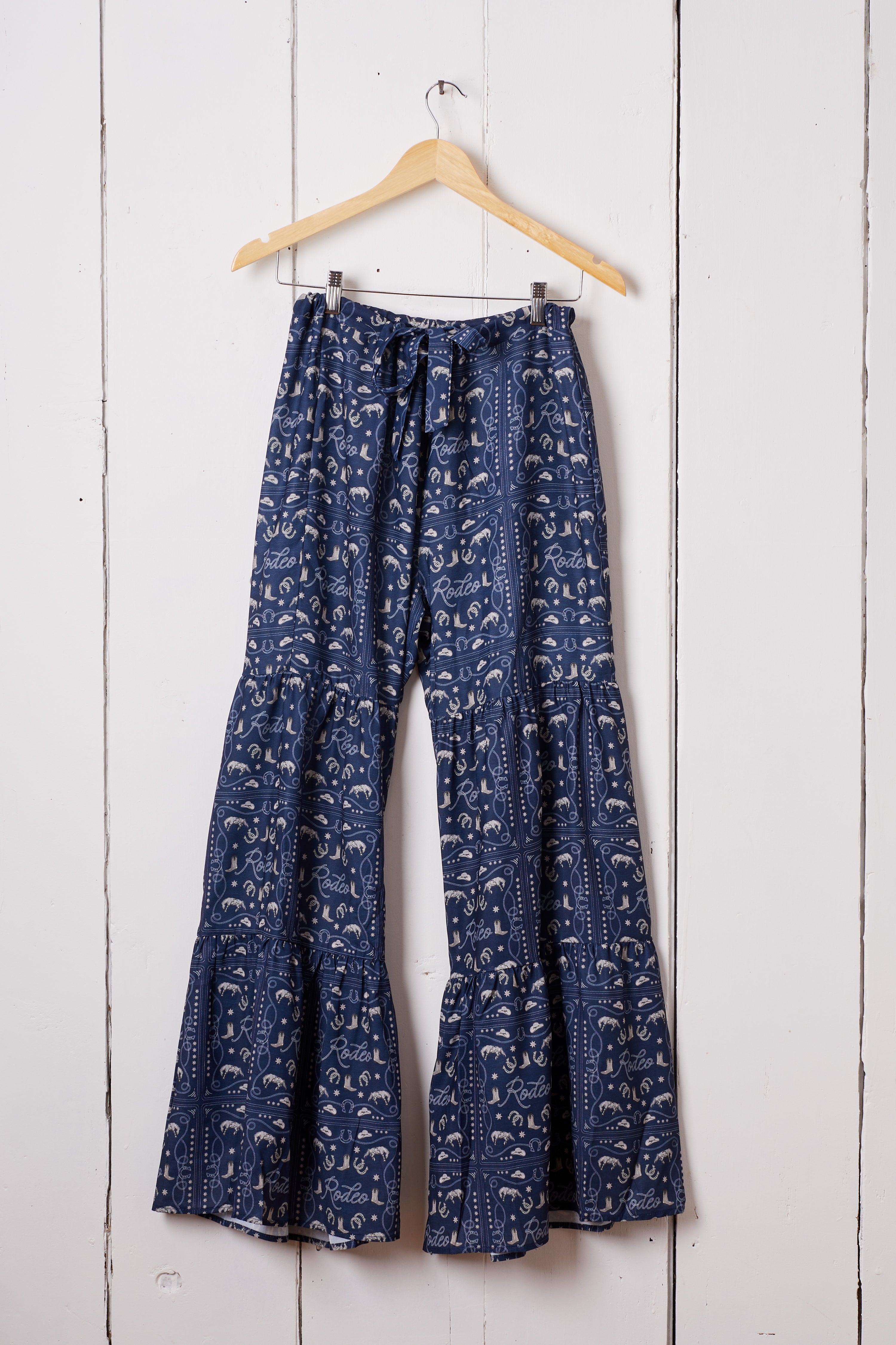 NAVY RODEO RUFFLE PANTS