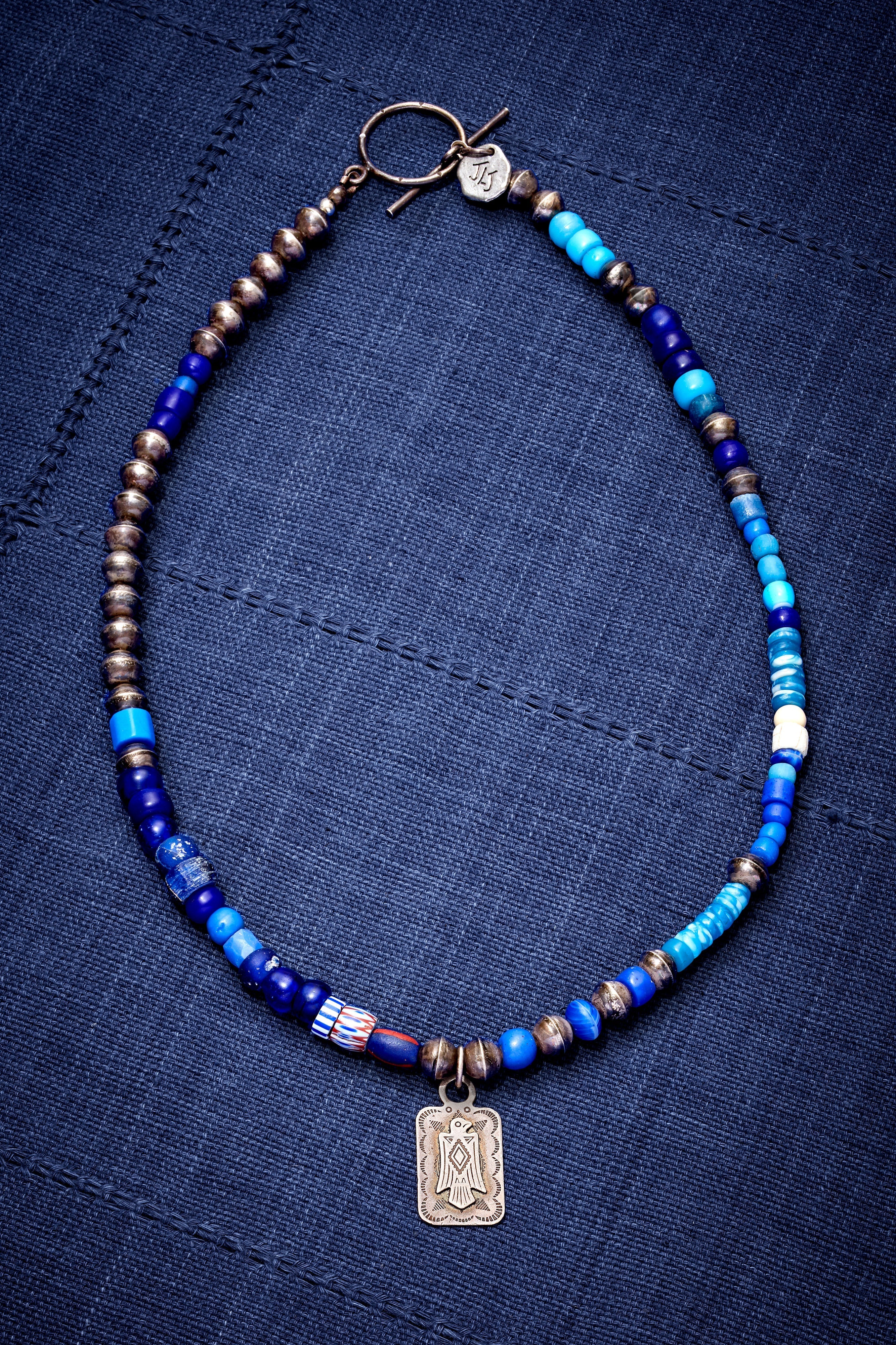 OXIDIZED STERLING SILVER AND BLUE NECKLACE WITH VINTAGE THUNDERBIRD PENDANT