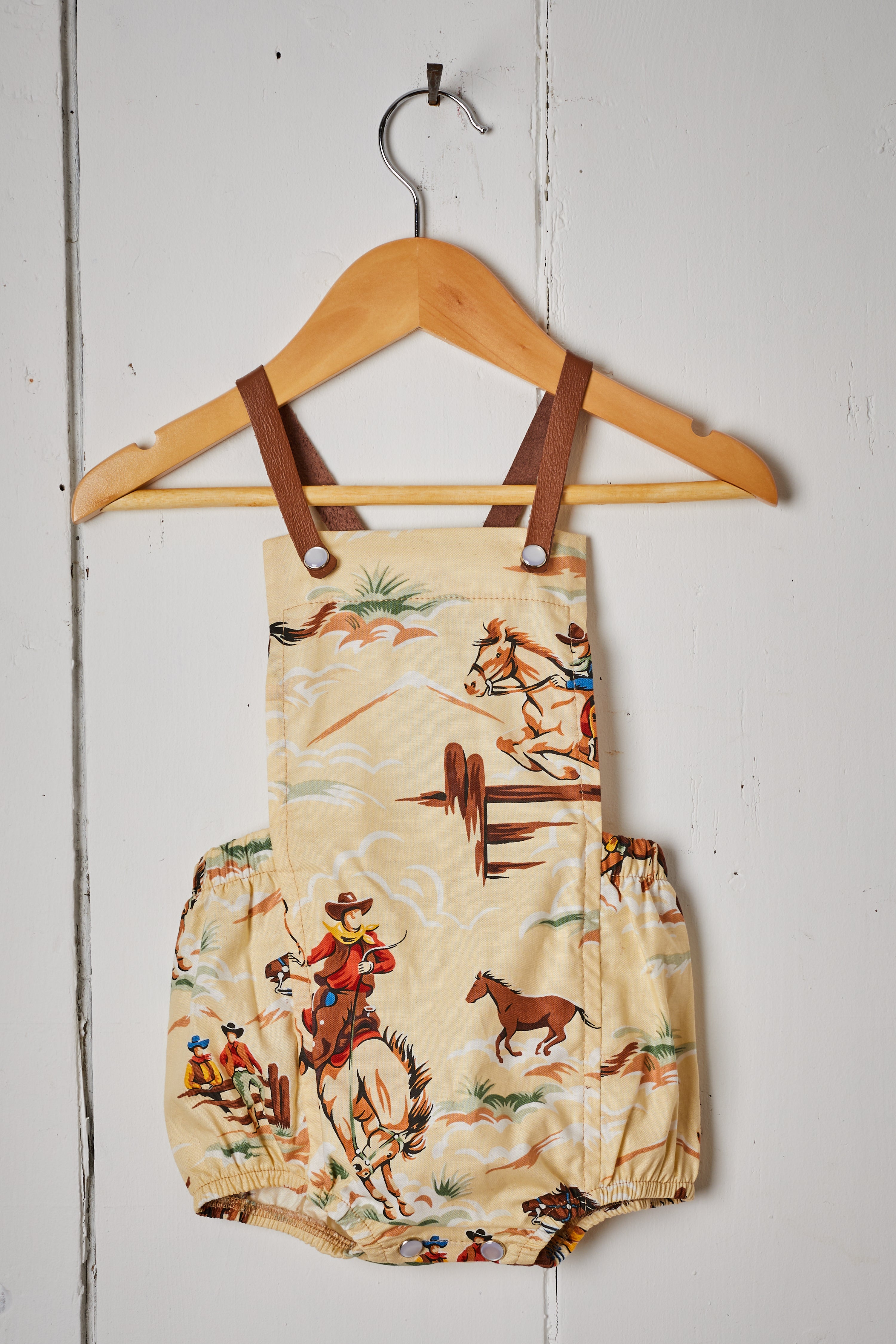 CREAM WILD WEST BABY ROMPER