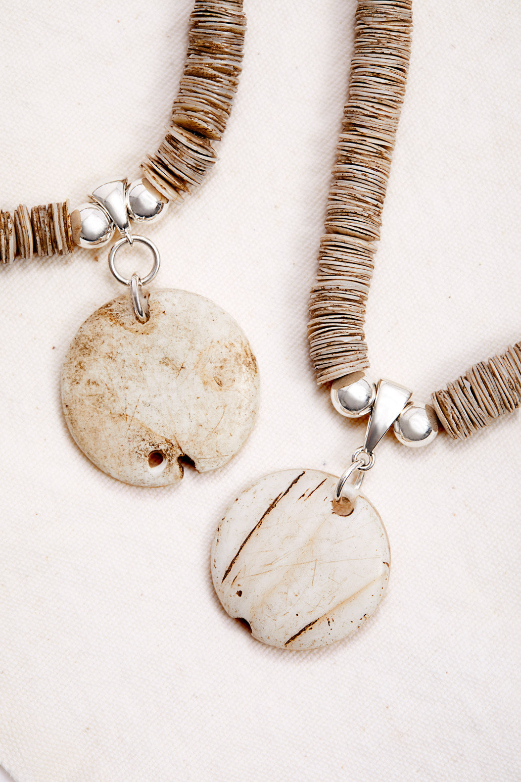 PINK MOONSTONE AND RHODOCHROSITE DOUBLE STRAND NECKLACE WITH NAGA SHELL PENDANTS