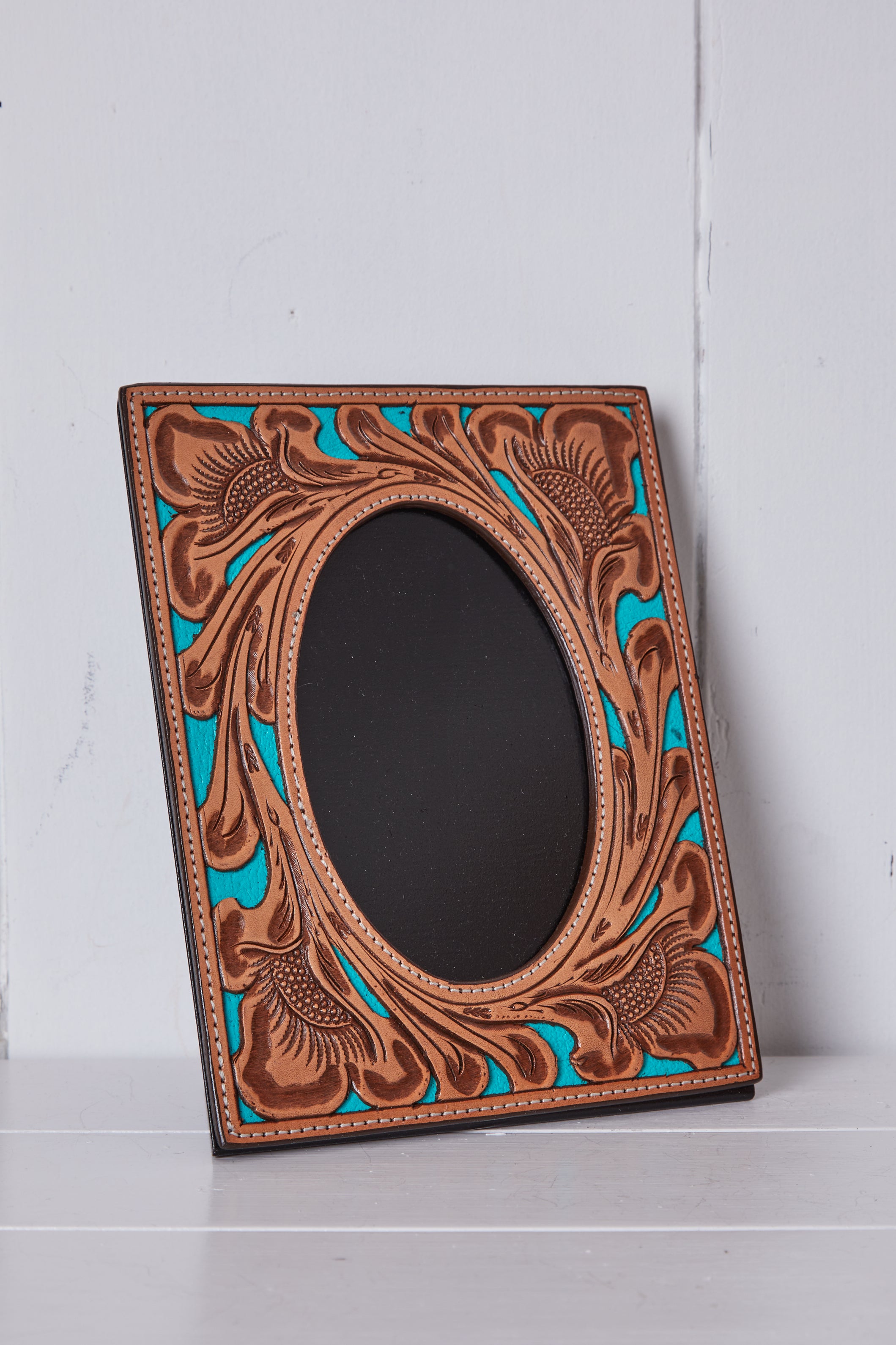 LIGHT TAN AND TURQUOISE TOOLED LEATHER PICTURE FRAME -