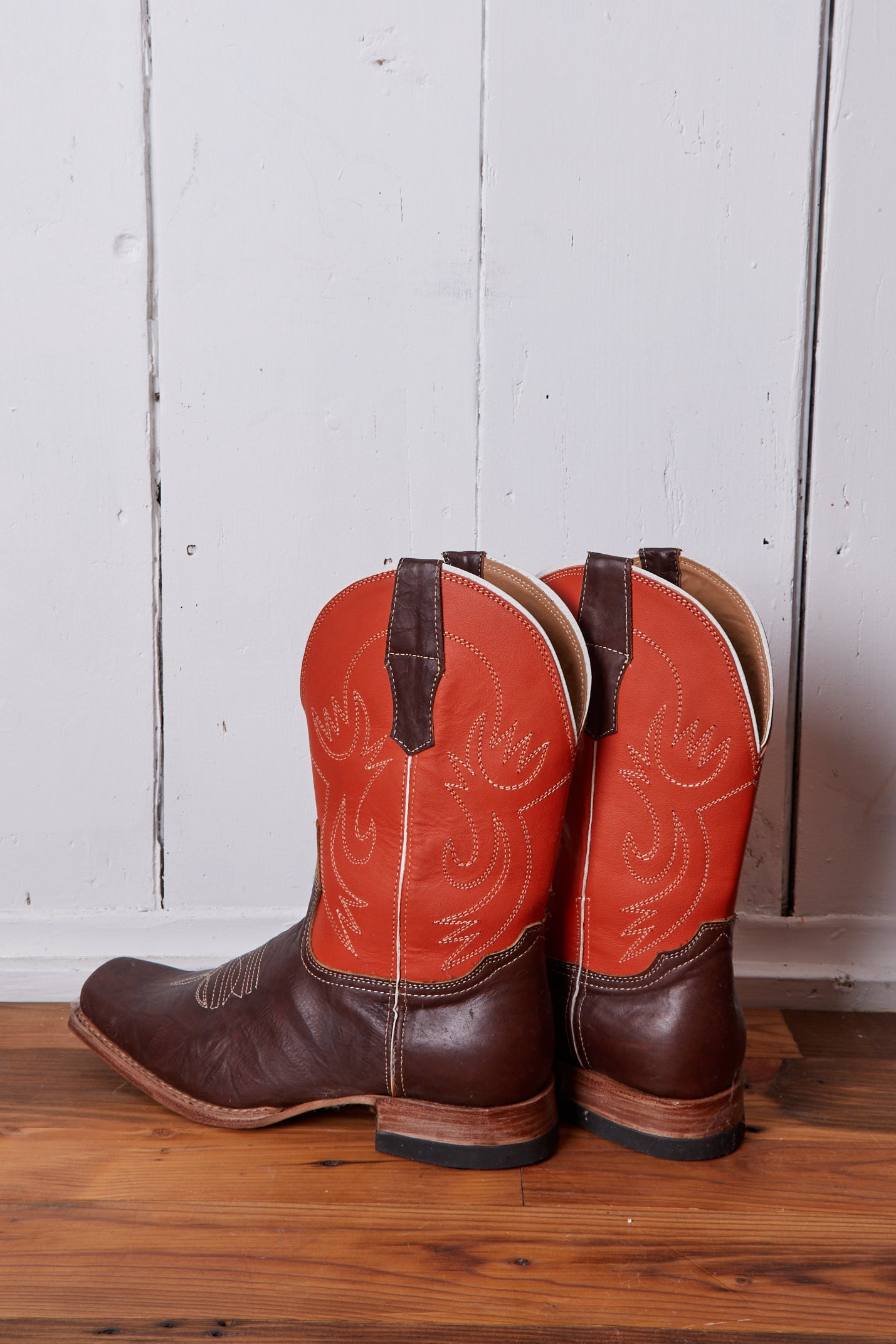 DARK BROWN AND ORANGE COWBOY BOOTS