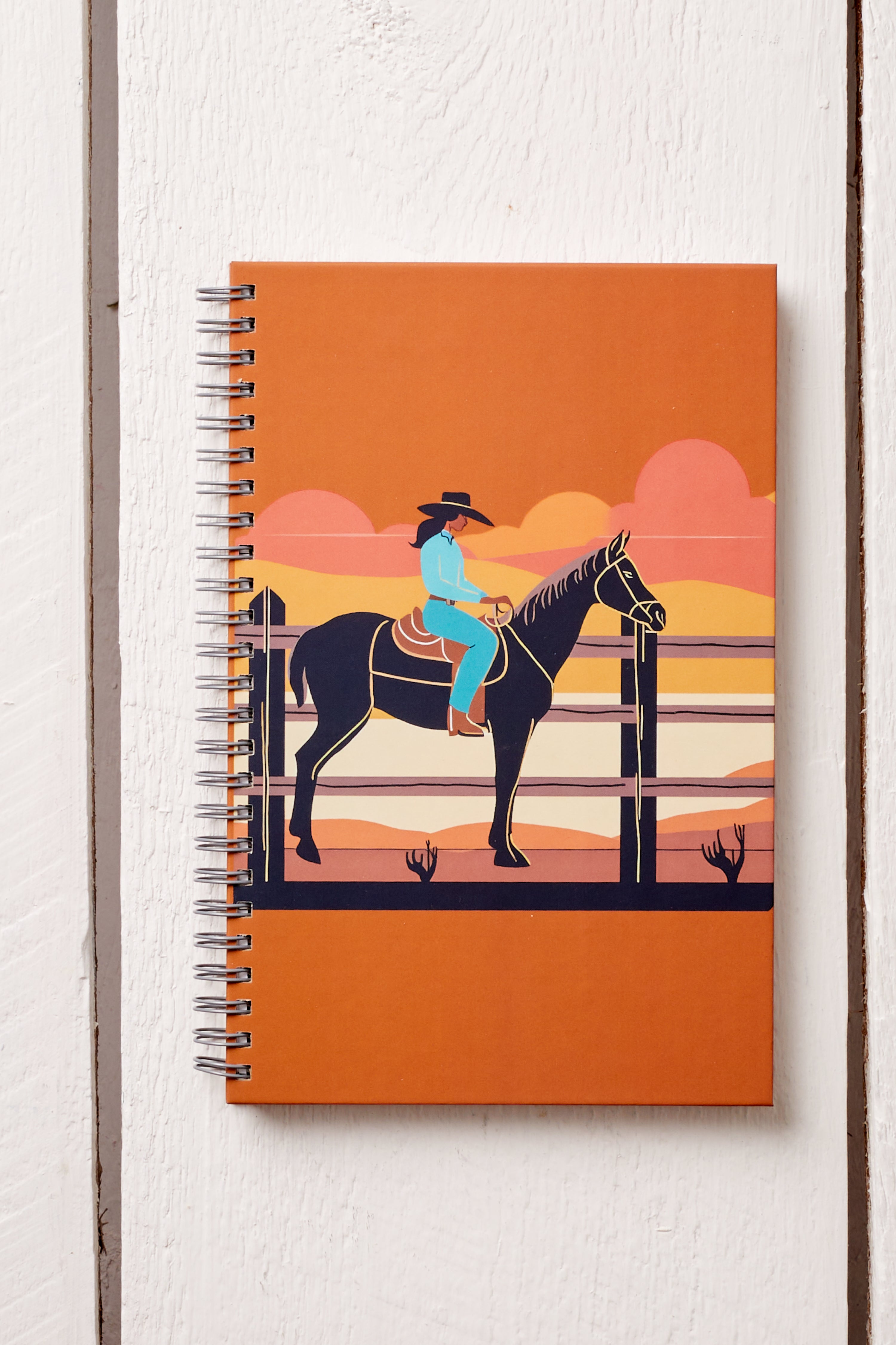 COWGIRL RIDING HORSE IN THE DESERT HARDCOVER JOURNAL