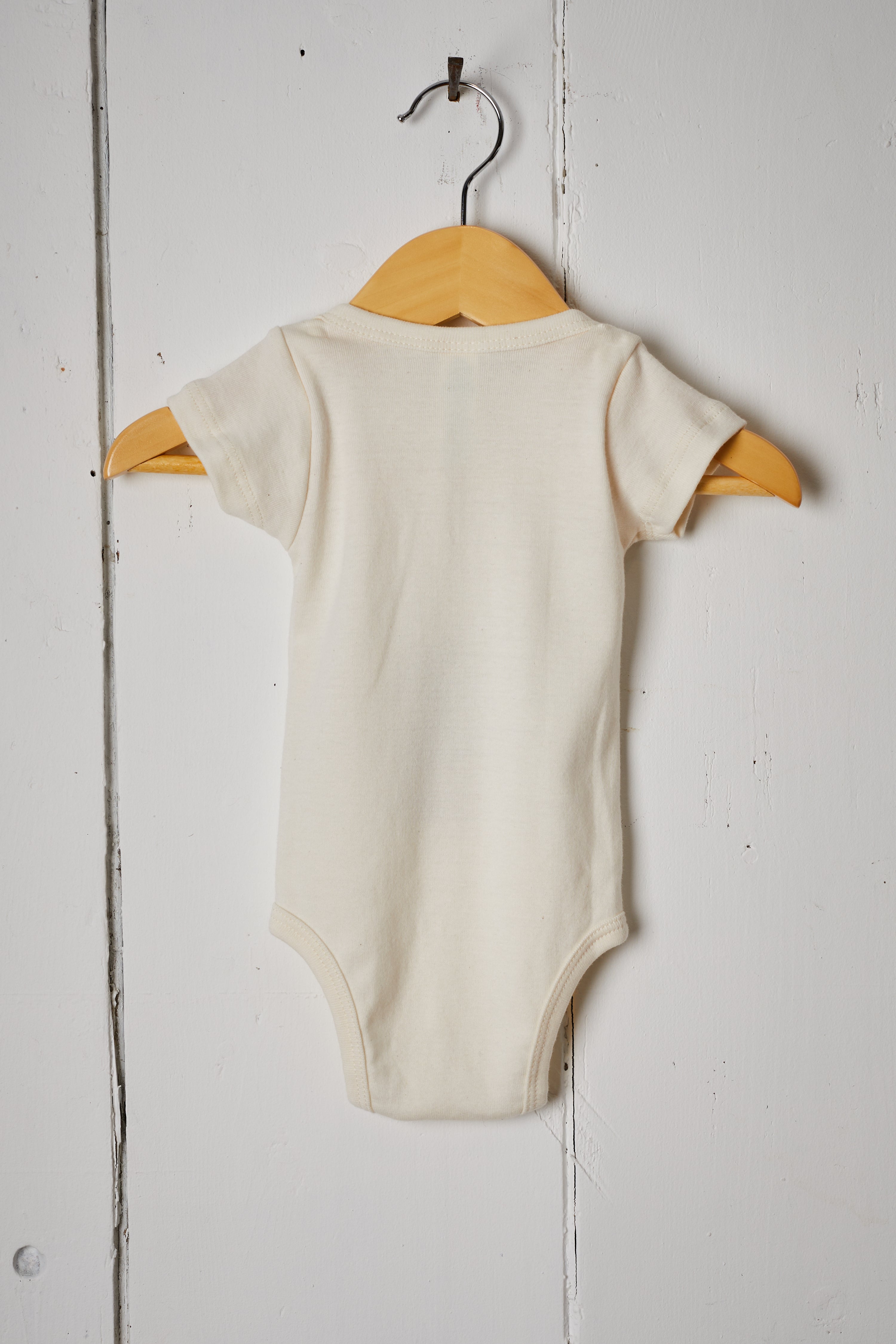 CREAM THIS IS MY FIRST RODEO BABY ONESIE