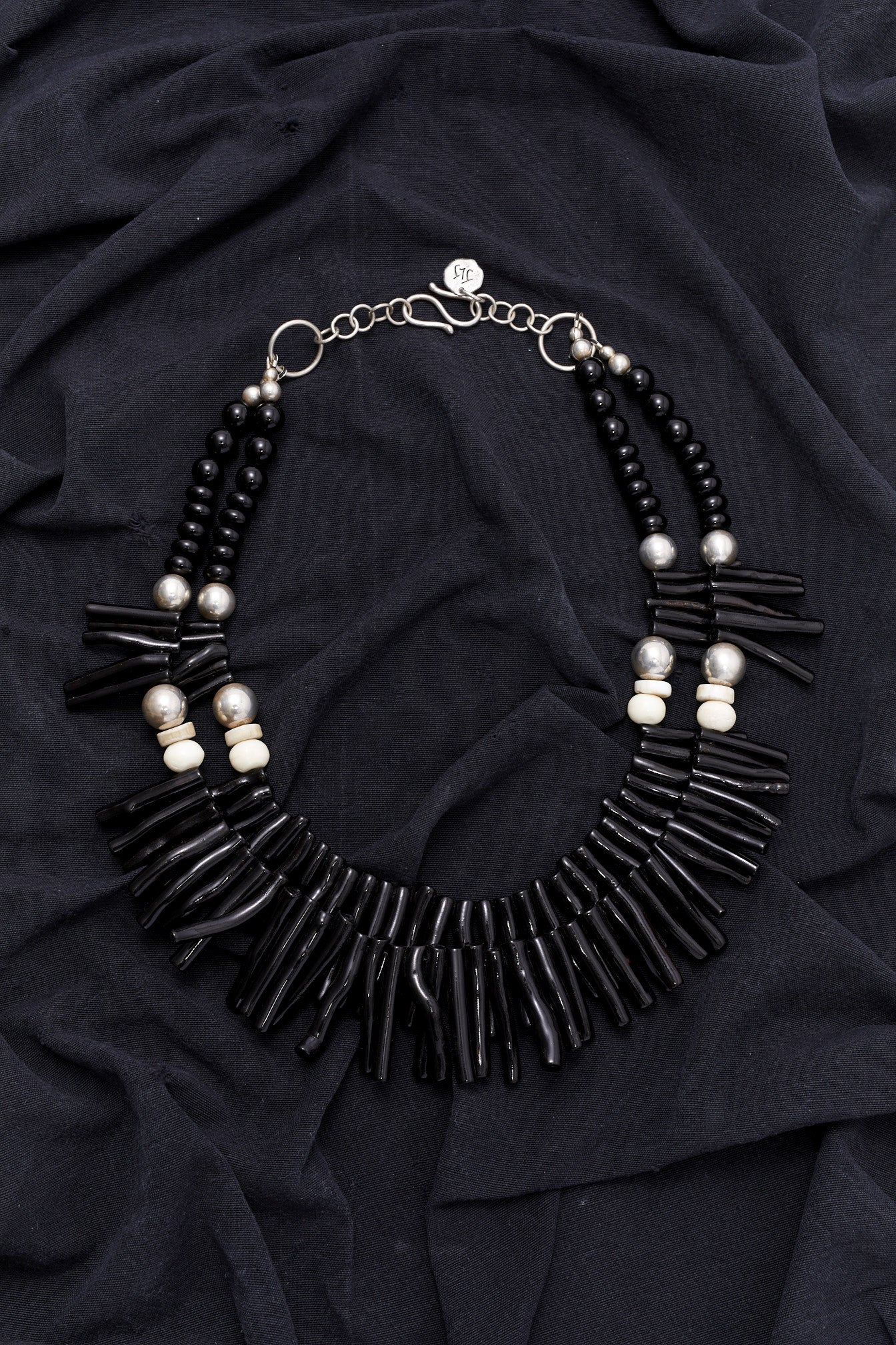 DOUBLE STRAND BLACK CORAL AND CONCH SHELL NECKLACE