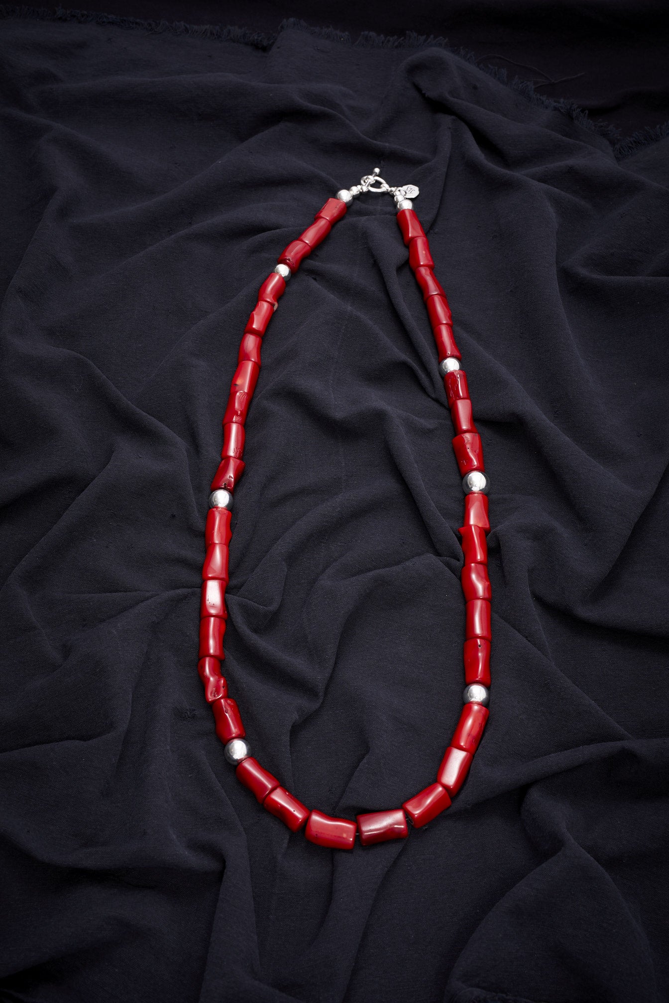 LONG CORAL RED AND STERLING SILVER NECKLACE