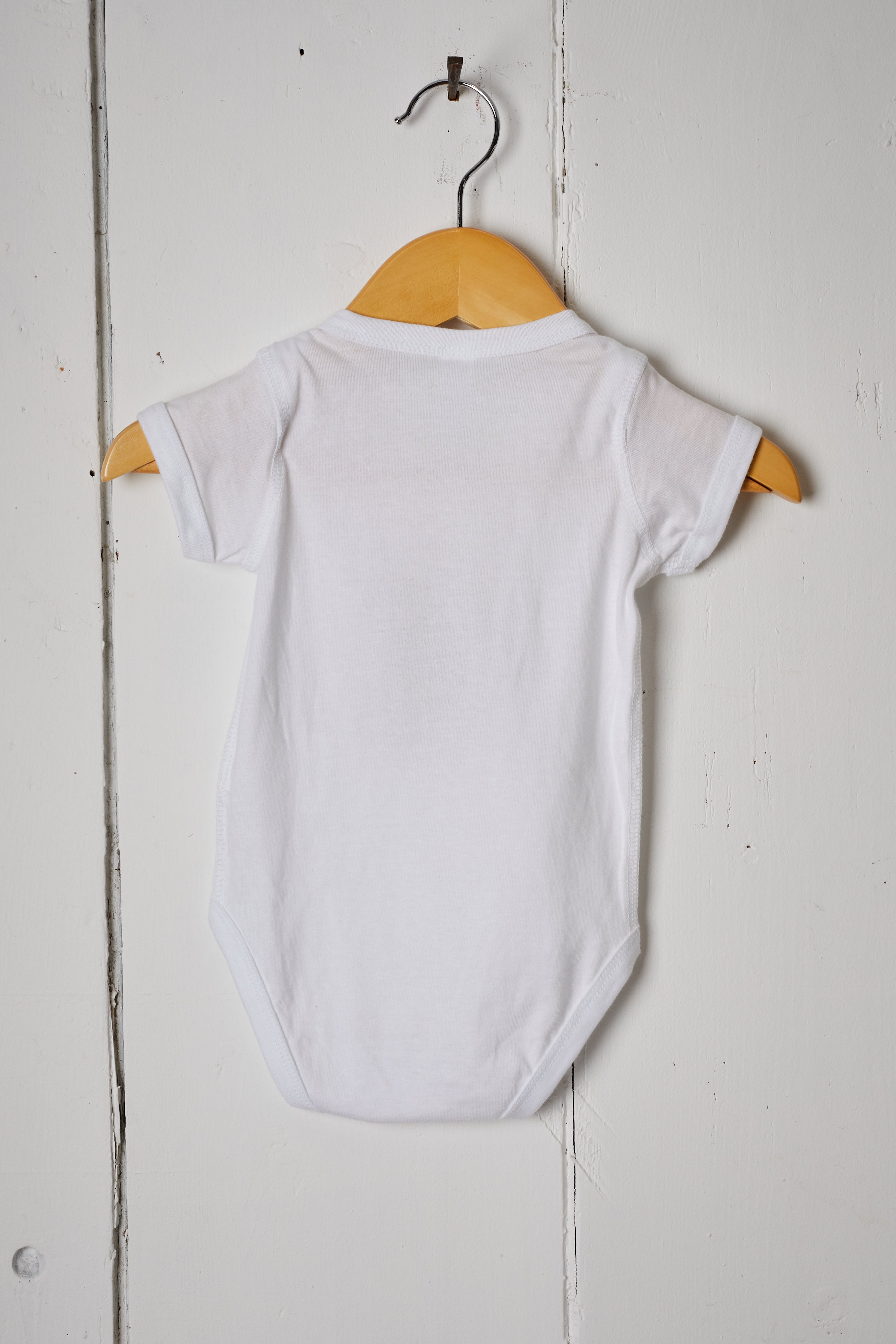 JENNY’S BARN BABY RAINBOW ONESIE