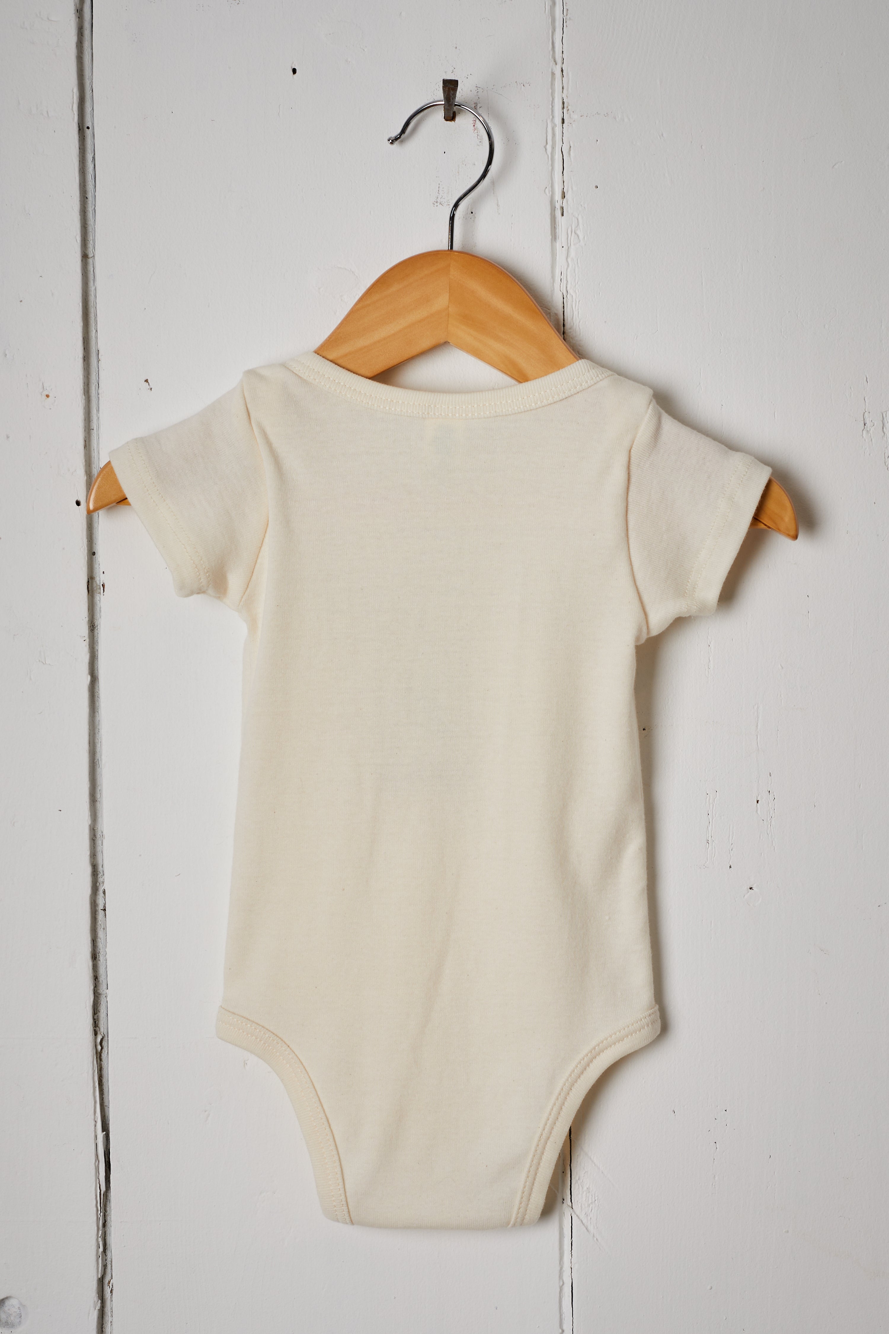 CREAM GIDDY UP BABY ONESIE