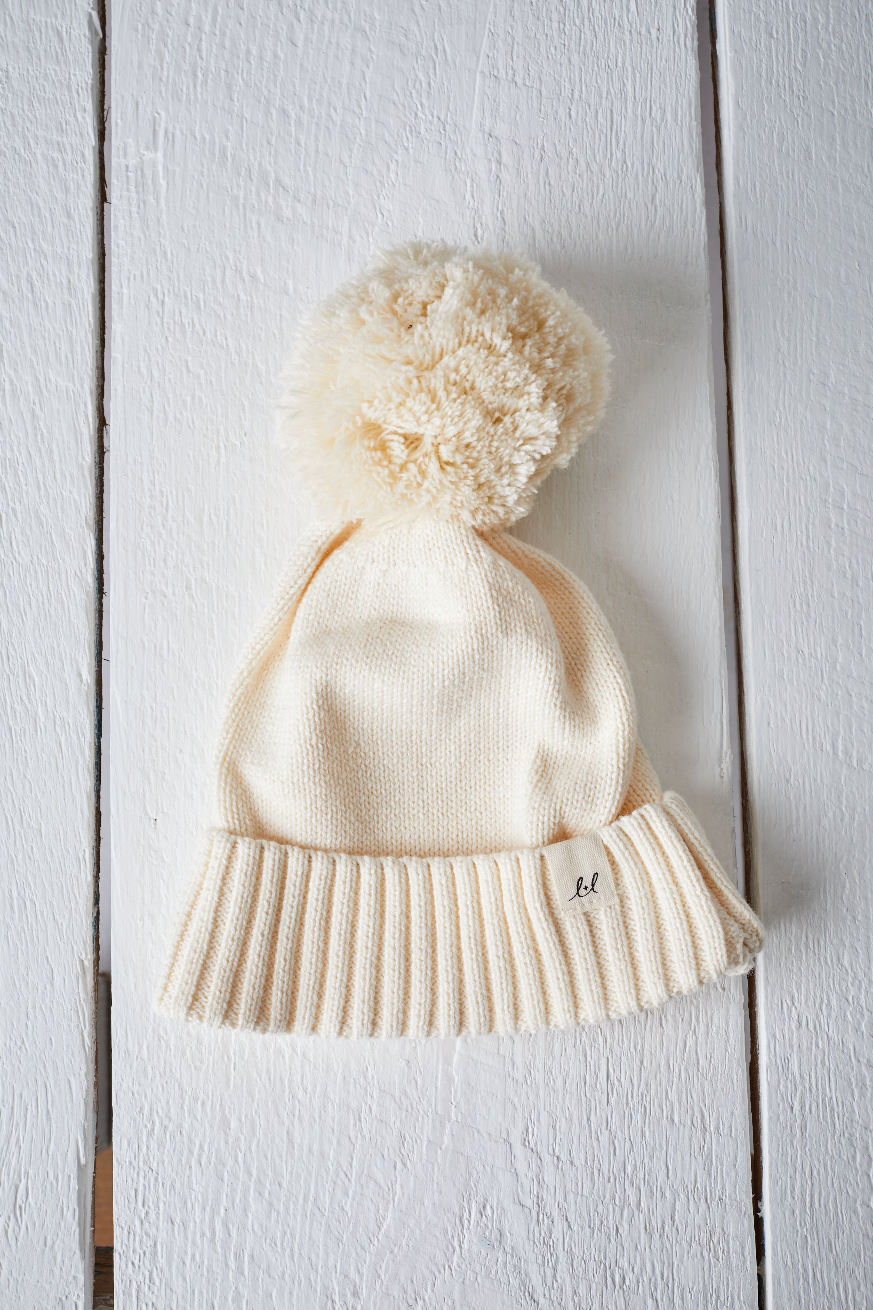 CREAM BABY BEANIE