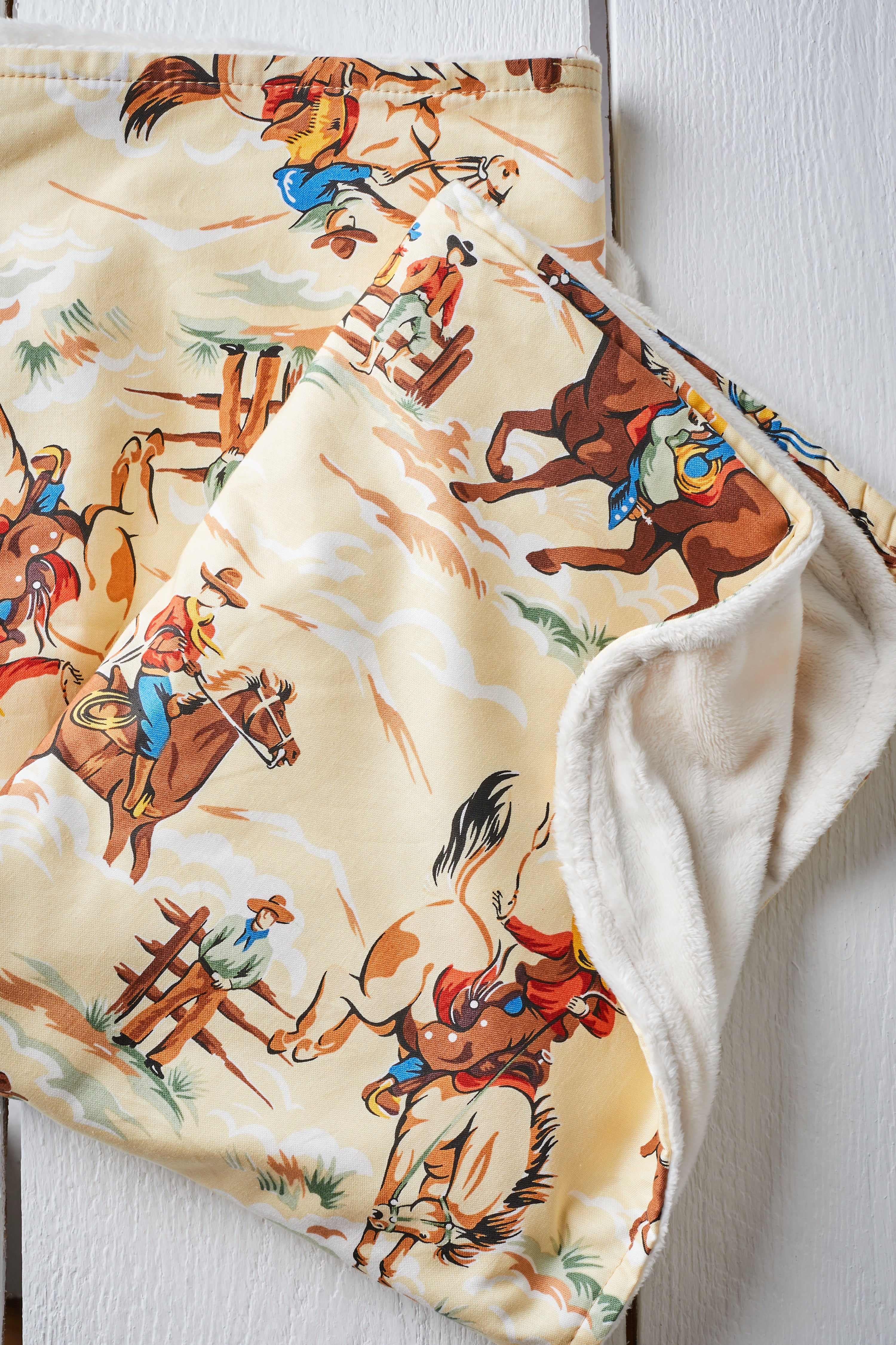 CREAM WILD WEST BABY BLANKET
